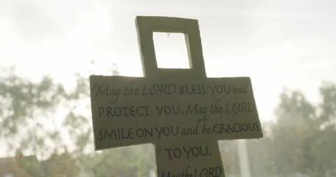 Cross with Bible Scripture and Rain in the background Stock Footage 229826749