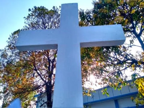 Cross on blue sky Stock Photos