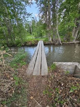 Cross bridge over river Foto stock