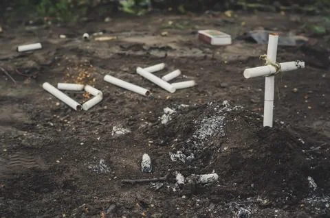 A cross from butts. Stock Photos