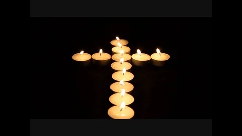 Cross candle light Stock Footage 79736516