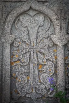 Cross carved in stone Stock Photos