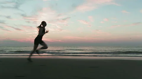 Cross Country Runner on a Beach Stock Footage