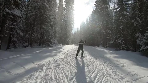 Cross-country skiing winter training. The athlete develops good speed. Stock Footage 252854878