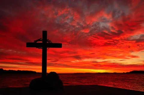 Cross With Crown of Thorns Flames Clouds Salvation Stock Photos