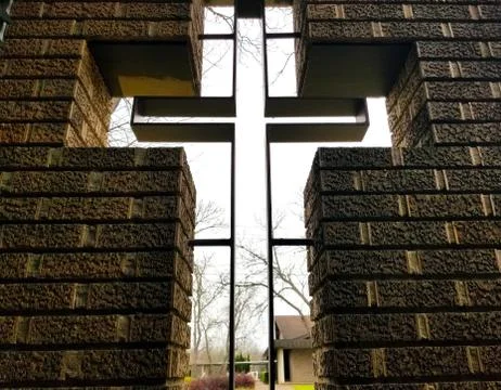 Cross embedded in the wall Stock Photos