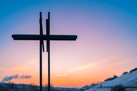 Cross with the evening sky Stock Photos
