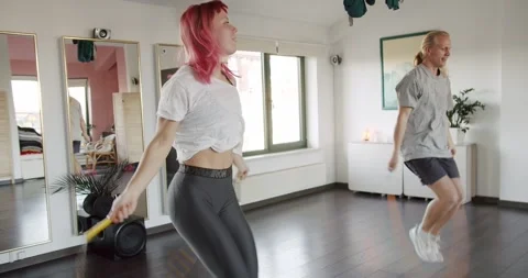 Cross Fitness Training Program. Exercises with Jumping Rope in a Loft Style Gym. Stock Footage 248983026