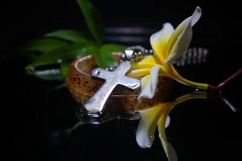 Cross with flowers Stock Photos