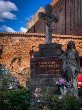 Cross in front of the Brigittenkirche in Danzig in Poland Stock Photos