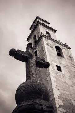 Cross in front of the steeple of the Merida Cathedral, Yucatan, Mexico Stock Photos