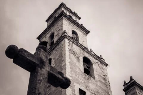 Cross in front of the steeple of the Merida Cathedral, Yucatan, Mexico Stock Photos