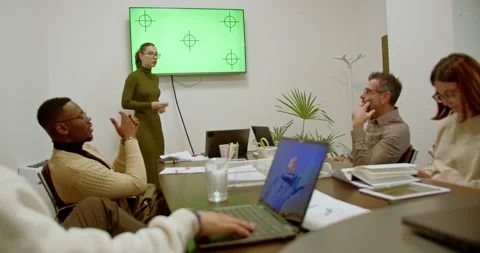 Cross generational, multicultural business team discussing work during office Stock Footage 271213301