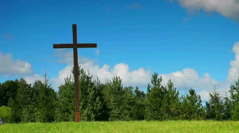 Cross on hill with moving clouds Stock Footage 802496