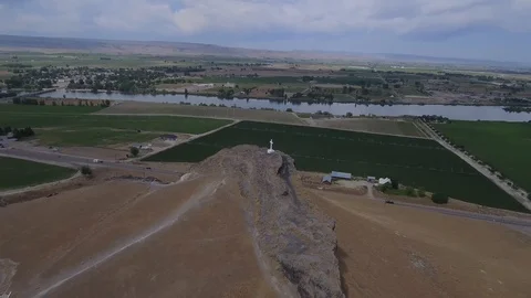 Cross on Hilltop Blue Sky River Below Stock Footage 99012196