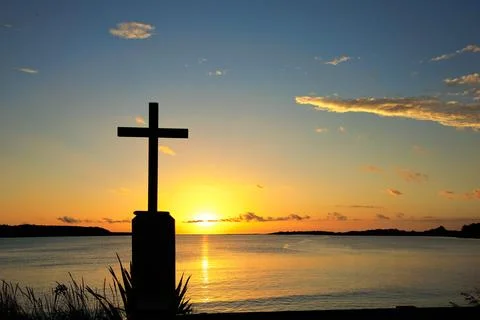 Cross Left Side At Foxton Beach River Bay Sunset In Background Stock Photos