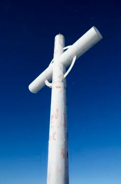 Cross at the mountain summit Stock Photos