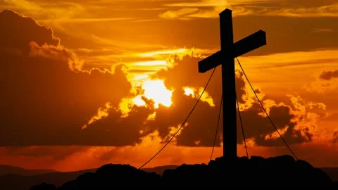 Cross on Mountain: Time Lapse at Sunset with Red Sun and Fiery Sky Stock Footage 152935399