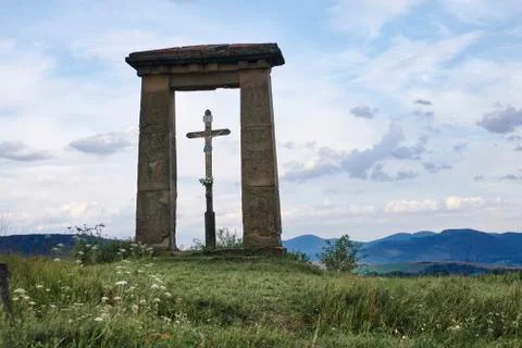 A cross in the mountains Stock Photos