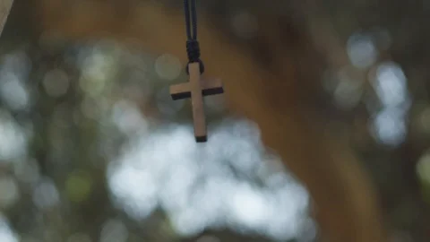 Cross Necklace Swinging, Slow Motion Stock Footage 125963864