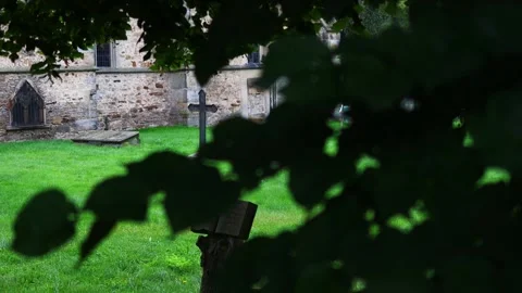 A cross on an old cementary video Stock-Footage 254438800
