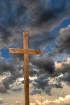 Cross over clouds Stock Photos