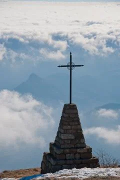 Cross over the clouds Stock Photos