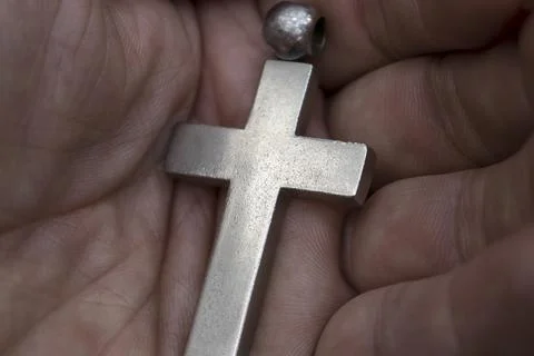 Cross in the palm. Stock Photos