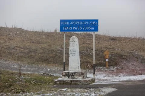 Cross Pass or Jvari Pass sign in Georgia. Stock Photos