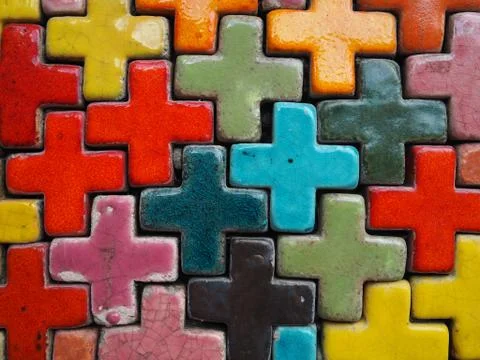 Cross plus shaped tiles background Foto stock