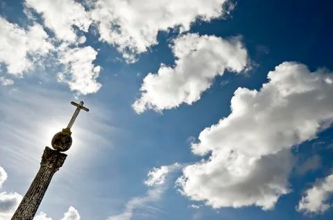 Cross pointing the sky Stock Photos