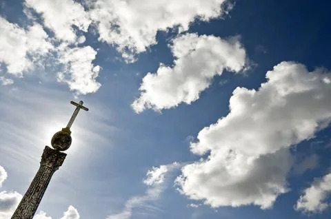 Cross pointing the sky Stock Photos