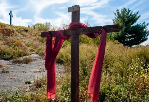 Cross with red drape Stock Photos