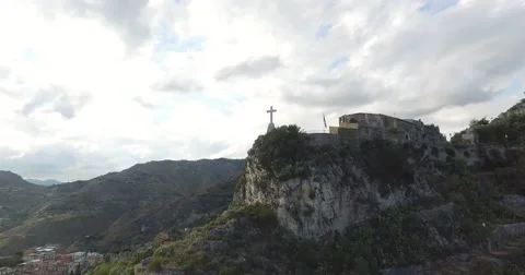 Cross On The Rock Over Cloudy Sky Stock Footage 61285155