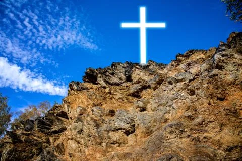 Cross to the rock Stock Photos