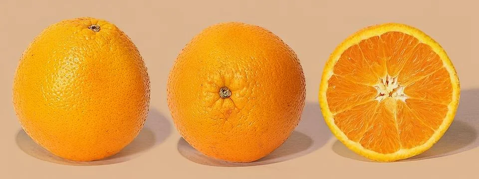 A cross-section of a citrus fruit Stock Photos