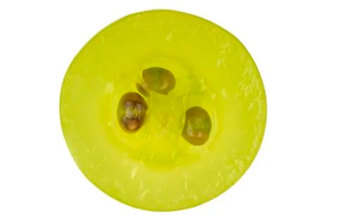 Cross section of green grape isolated in white Stock Photos