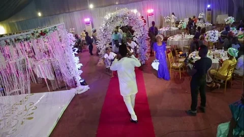 Cross section of guest dancing at a Nigerian Traditional Wedding Stock Footage 310639333