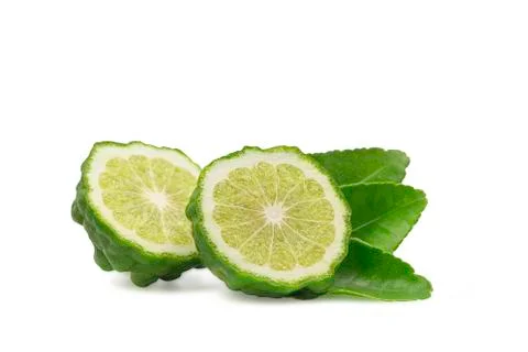 Cross Section or a half bergamot or kaffir on white isolated background with  Stock Photos