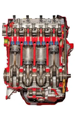 A cross-sectional view reveals the complexity of an engine block, highlightin Stock Photos