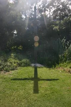 Cross, Shadow &amp; Grass Stock Photos