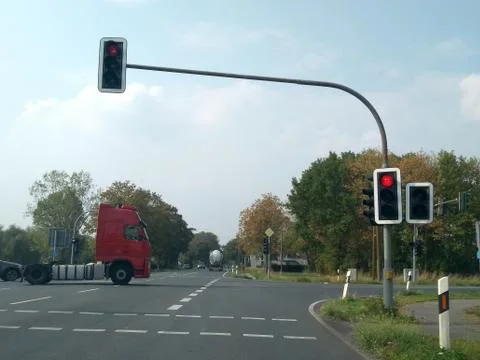 Cross shaped intersection with traffic lights on red Stock Photos