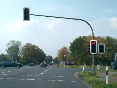 Cross shaped intersection with traffic lights on red Stock Photos