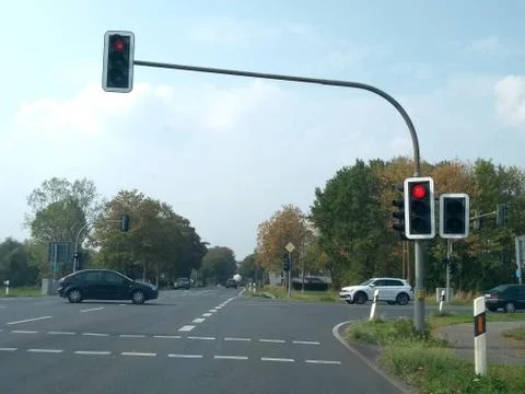 Cross shaped intersection with traffic lights on red Stock Photos