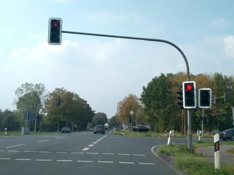 Cross shaped intersection with traffic lights on red Stock Photos
