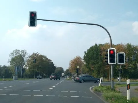 Cross shaped intersection with traffic lights on red Stock Photos