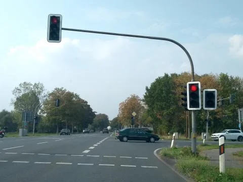 Cross shaped intersection with traffic lights on red Stock Photos