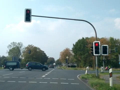 Cross shaped intersection with traffic lights on red Stock Photos