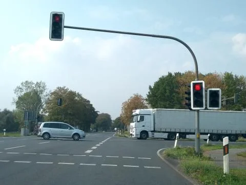 Cross shaped intersection with traffic lights on red Stock Photos