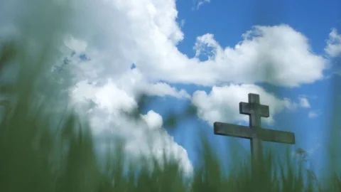 Cross. Shooting from the bottom point, grass. Ukraine, Opishnya. time lapse Stock Footage 77272288